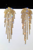 Pendientes colgantes de pedrería de oro