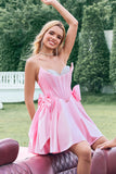 Hermoso vestido de fiesta corto con espalda corsé con cuentas y sin tirantes en color rosa con lazos