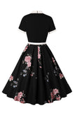 Vestidos de la década de 1950 con estampado floral azul y mangas cortas
