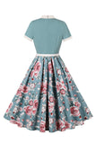 Vestidos de la década de 1950 con estampado floral azul y mangas cortas