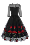 Vestido negro A Line Rose Floral de la década de 1950 con medias mangas