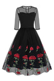 Vestido negro A Line Rose Floral de la década de 1950 con medias mangas