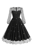 Vestido floral azul A de la década de 1950 con mangas largas