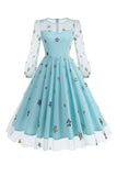 Vestido floral azul A de la década de 1950 con mangas largas