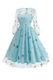 Vestido floral azul A de la década de 1950 con mangas largas
