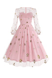 Vestido floral azul A de la década de 1950 con mangas largas