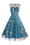 Elegante vestido midi sin mangas bordado floral color albaricoque