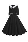 Vestido midi negro de manga corta con escote en V y línea A de la década de 1950