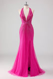 Vestido largo de fiesta con cuentas y espalda abierta de sirena fucsia con abertura