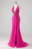 Vestido largo de fiesta con cuentas y espalda abierta de sirena fucsia con abertura