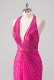 Vestido largo de fiesta con cuentas y espalda abierta de sirena fucsia con abertura