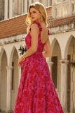 Vestido largo de graduación floral Línea A en fucsia con tirantes finos de brocado jacquard