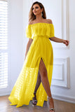 Vestido formal largo amarillo con volantes y aberturas en línea A