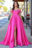 Vestido de fiesta con apliques de apliques de satén fucsia con abertura