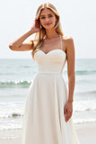 Vestido de novia largo de satén con tirantes finos blancos sencillos de línea A