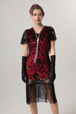 Vestido negro brillante con flecos dorados con escote en V de la década de 1920 con mangas cortas