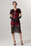 Vestido negro brillante con flecos dorados con escote en V de la década de 1920 con mangas cortas
