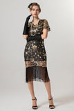 Vestido negro brillante con flecos dorados con escote en V de la década de 1920 con mangas cortas