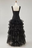 Vestido formal negro de organza con volantes alto y bajo