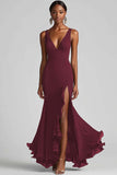 Vestido formal de sirena con volantes y escote en V negro con abertura