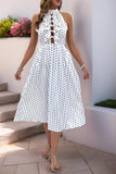 Vestido de verano halter de lunares blanco negro con lazo