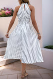 Vestido de verano halter de lunares blanco negro con lazo