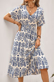 Vestido de verano midi azul con estampado de una línea