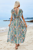 Vestido de verano verde con estampado de mangas abullonadas y abertura
