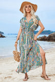 Vestido de verano verde con estampado de mangas abullonadas y abertura