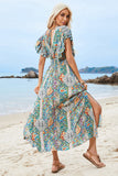 Vestido de verano verde con estampado de mangas abullonadas y abertura
