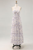 Vestido largo de invitada a boda con falda azul fruncido floral