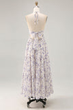 Vestido largo de invitada a boda con falda azul fruncido floral