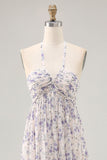 Vestido largo de invitada a boda con falda azul fruncido floral
