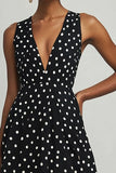 Vestido de lunares negros blancos con cuello en V de gasa