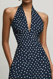 Vestido azul marino de lunares blancos halter con abertura