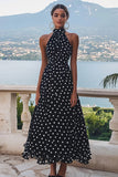 Vestido de lunares negro blanco de cuello alto de una línea