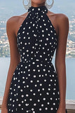 Vestido de lunares negro blanco de cuello alto de una línea