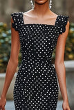 Vestido sirena negro blanco de lunares con volantes