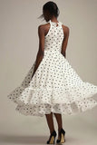 Vestido de lunares blancos negros con volantes y cuello alto con volantes