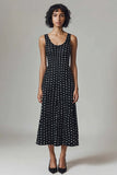 Vestido de lunares negro blanco con cuello redondo