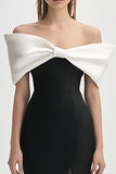 Vestido de cóctel ajustado con abertura y hombros descubiertos en color marfil y negro