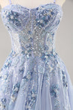 Vestido de fiesta largo con abertura y corsé de tul con lentejuelas sin tirantes azules