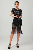 Vestido negro de lentejuelas Gatsby de los años 20 con flecos