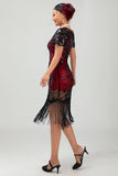 Vestido negro de lentejuelas Gatsby de los años 20 con flecos