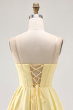 Vestido de cóctel corto con corsé amarillo sin tirantes con cuentas