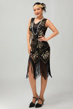 Vestido negro brillante con flecos dorados de la década de 1920