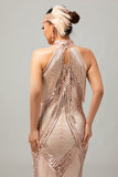 Vestido de lentejuelas con flecos y ojales de champán de los años 20