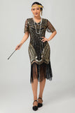 Vestido flapper ajustado de lentejuelas doradas negras de los años 20 con borlas