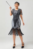 Vestido ajustado de la década de 1920 con cuello en V de lentejuelas plateadas negras y borlas