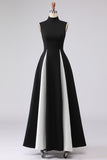 Elegante vestido formal largo de cuello alto en blanco y negro